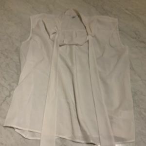White sleeveless top